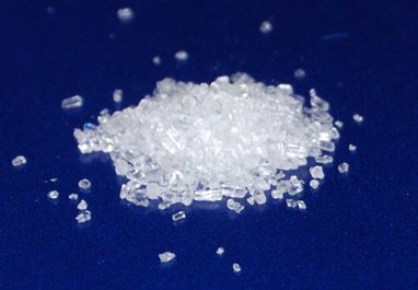 Fluoride removal resin